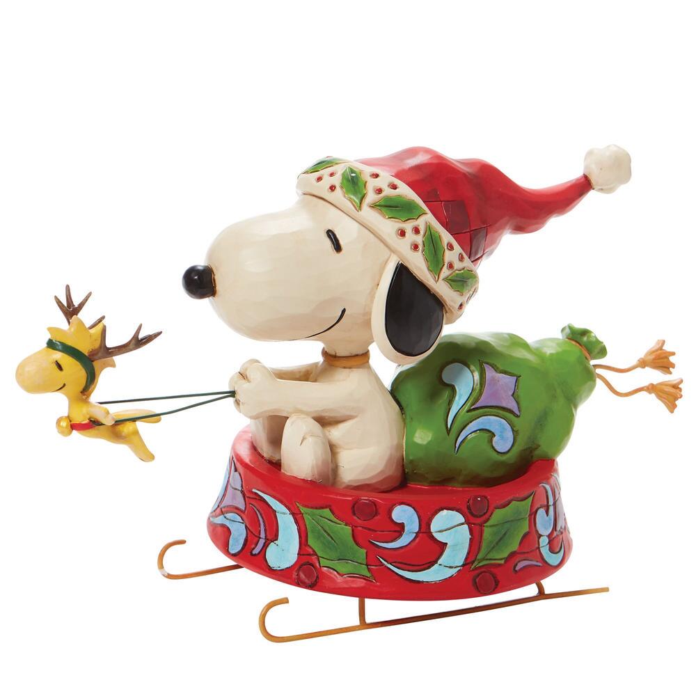 Jim Shore Peanuts-Santa Snoopy in Dog Bowl Sled